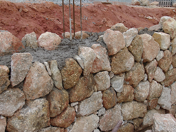 Construção de muro divisórios